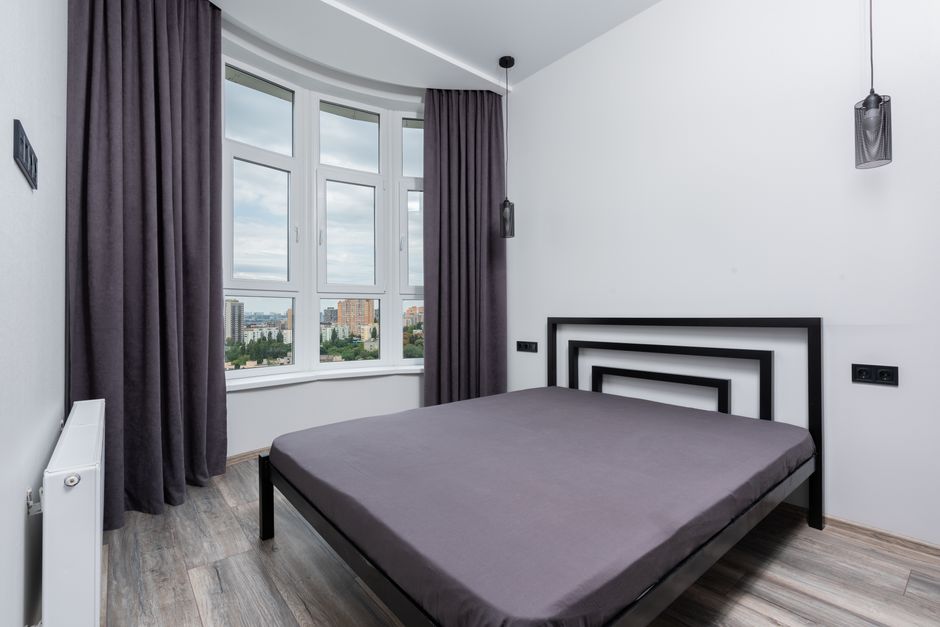 cozy dark bedroom with curtains
