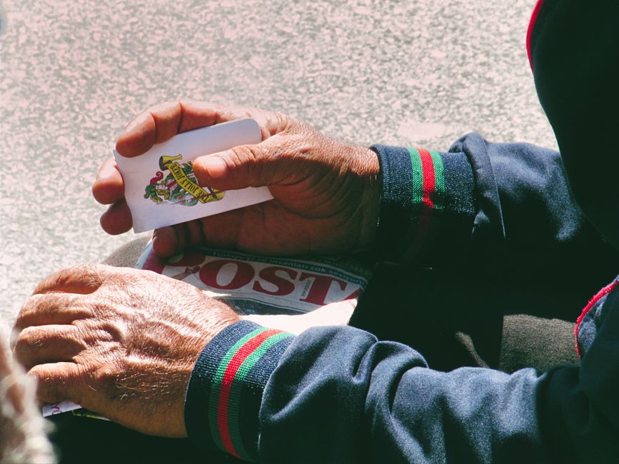 senior transit card in hand