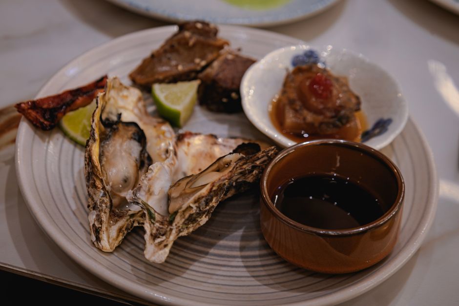 grilled beef and oysters on plate