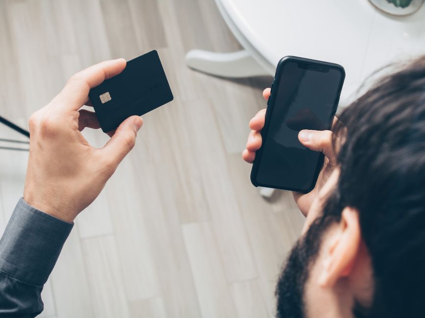 person using mobile phone payment