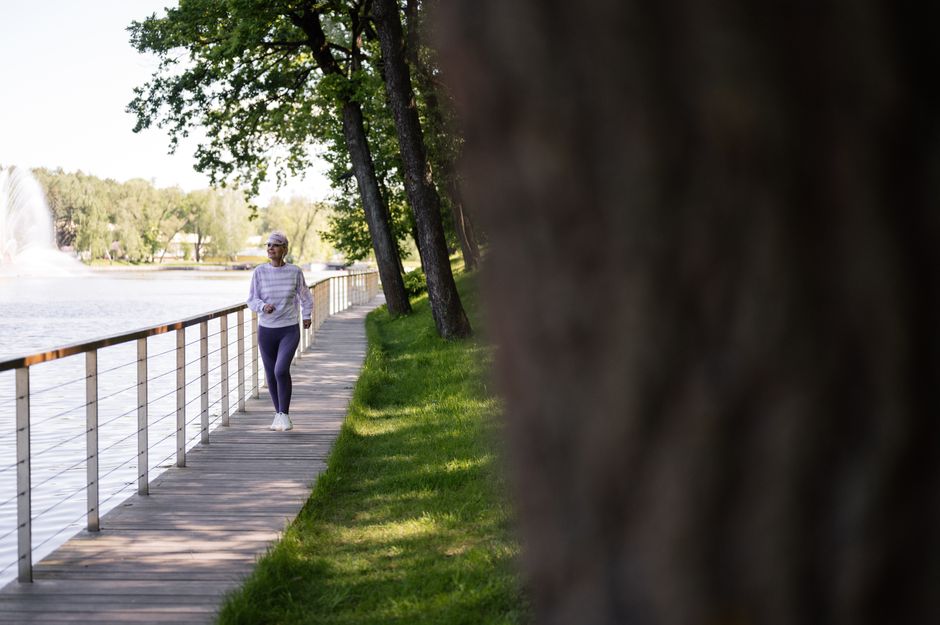 person walking exercise outdoors morning