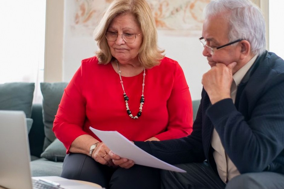 senior couple reviewing finances at home