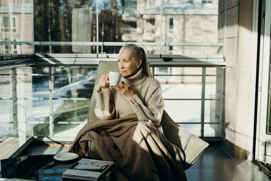 elderly woman warm blanket winter