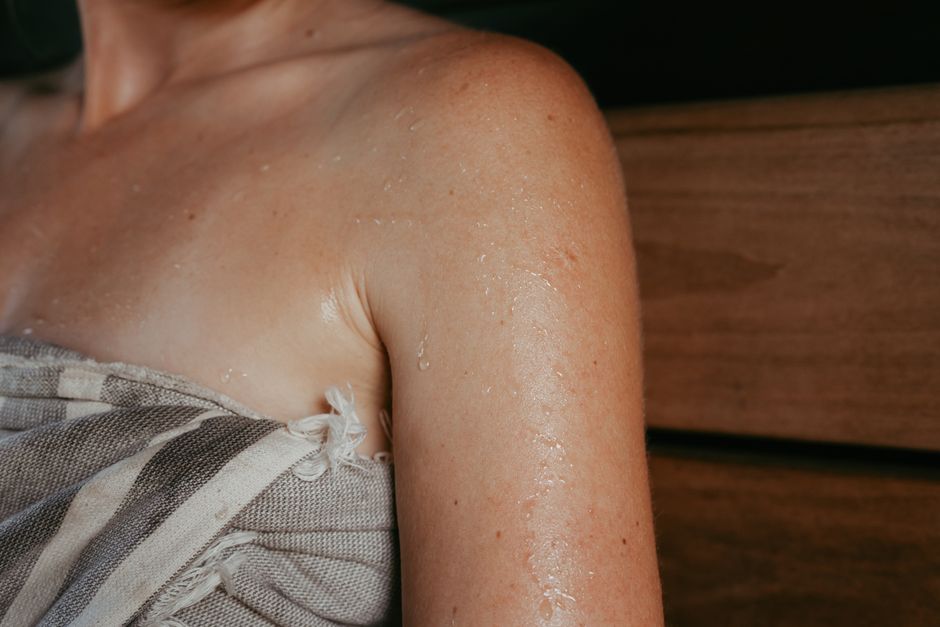 person sweating in summer heat