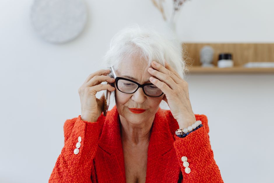 senior person worried on phone call