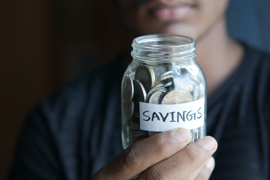 cash savings jar and coins financial planning