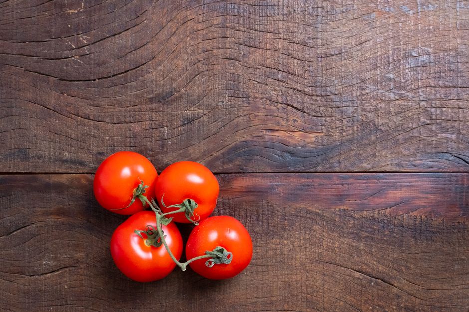 fresh tomatoes on table