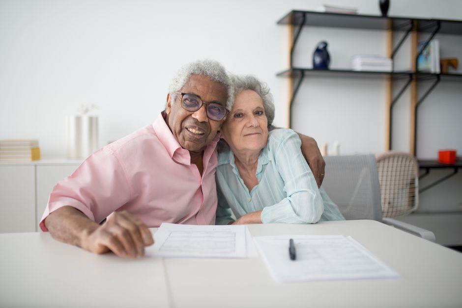 senior couple checking documents home