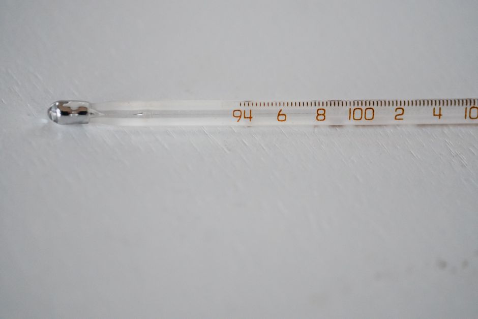 thermometer showing hot summer temperature