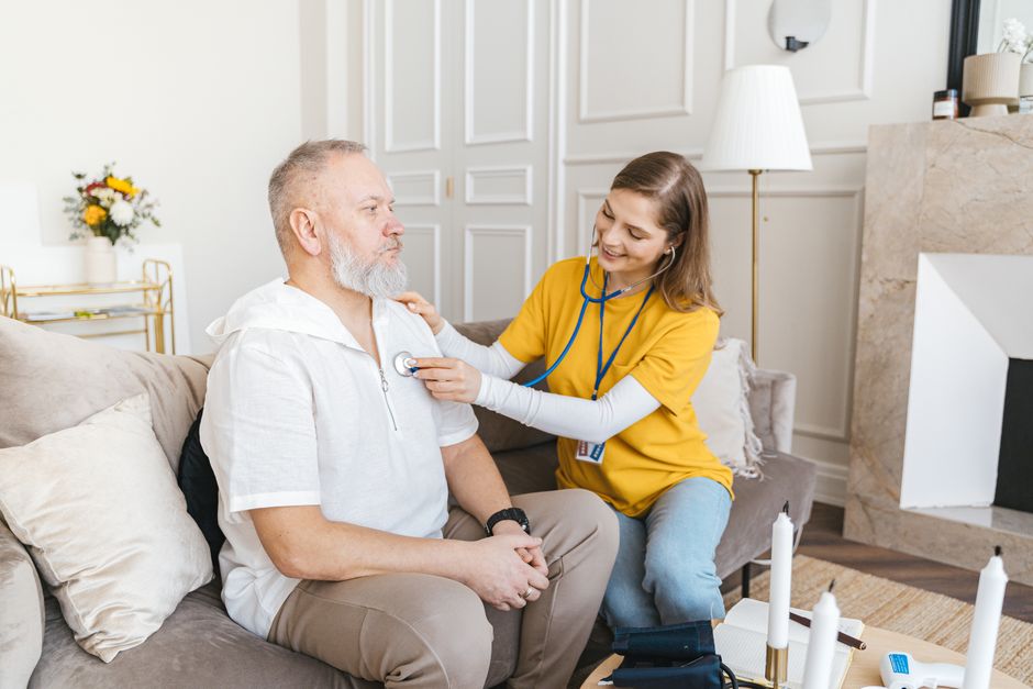 care worker visiting senior at home