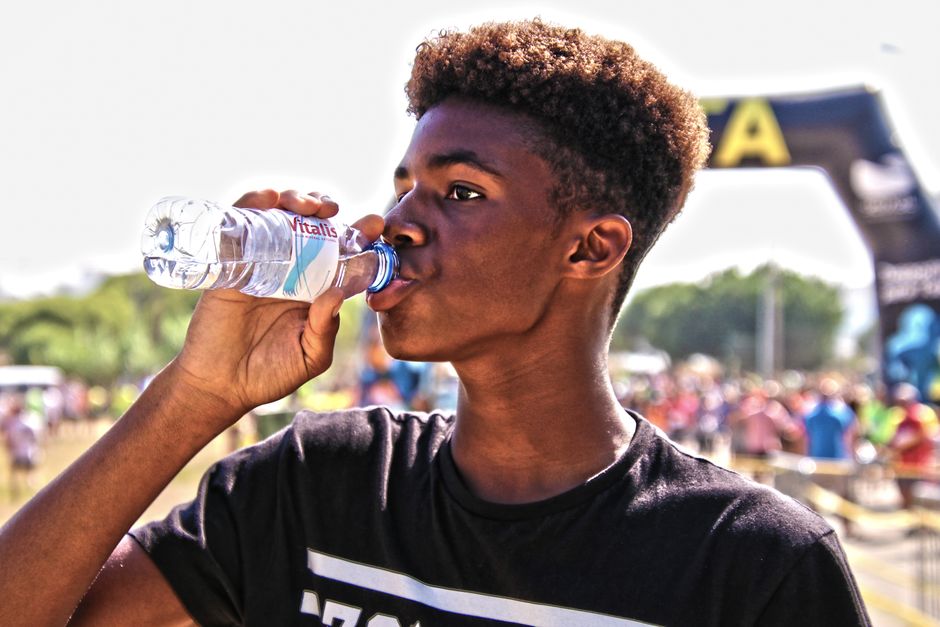 person drinking water hydration
