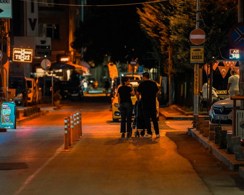 family walking together evening summer street