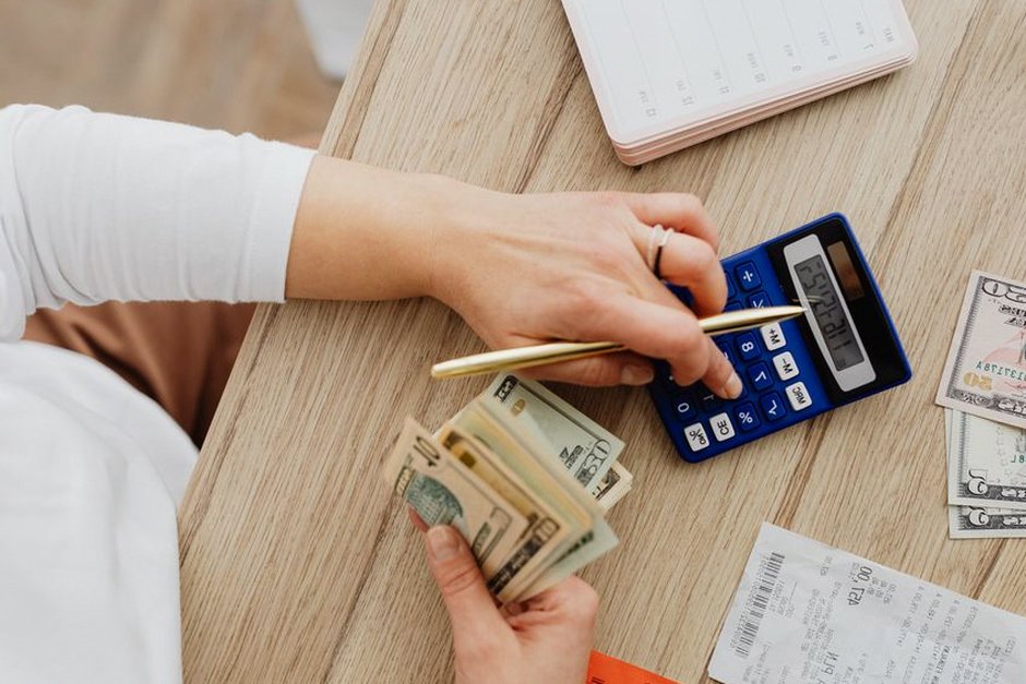 person calculating savings finance
