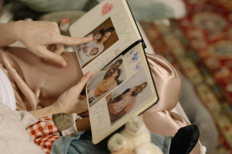 family sharing photo album memories together