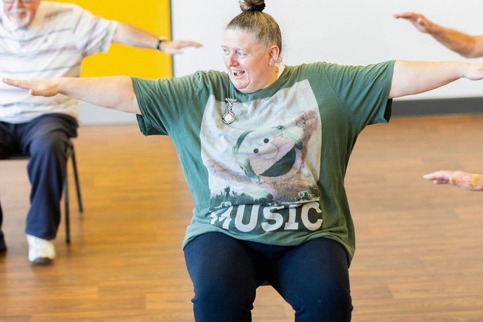 senior citizen indoor stretching exercise