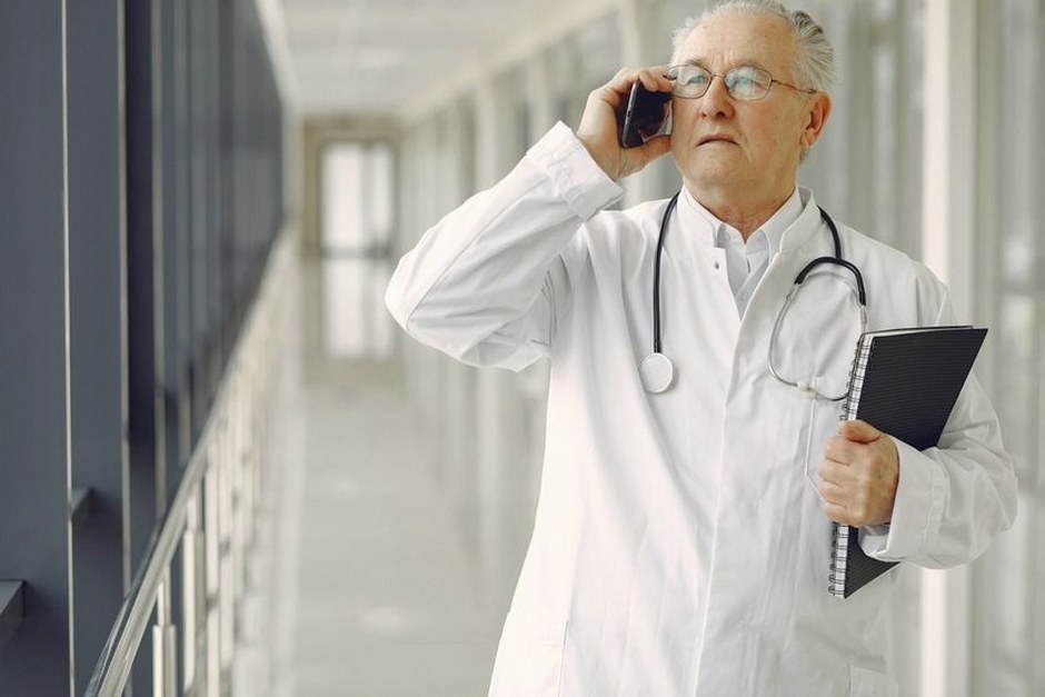 elderly korean man doctor consultation