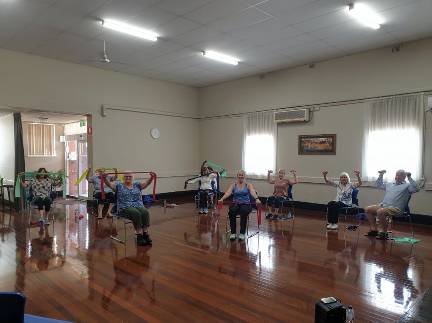 elderly person sitting on chair exercise