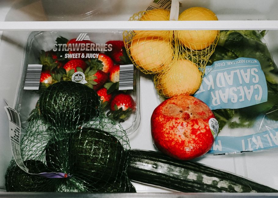 fresh vegetables organized in fridge drawer