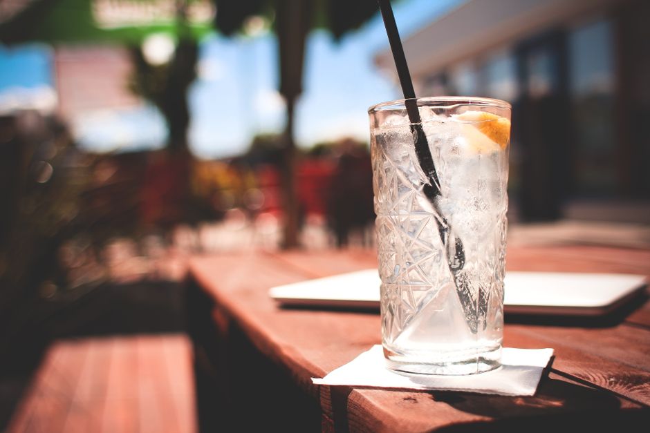 glass of water ice summer table