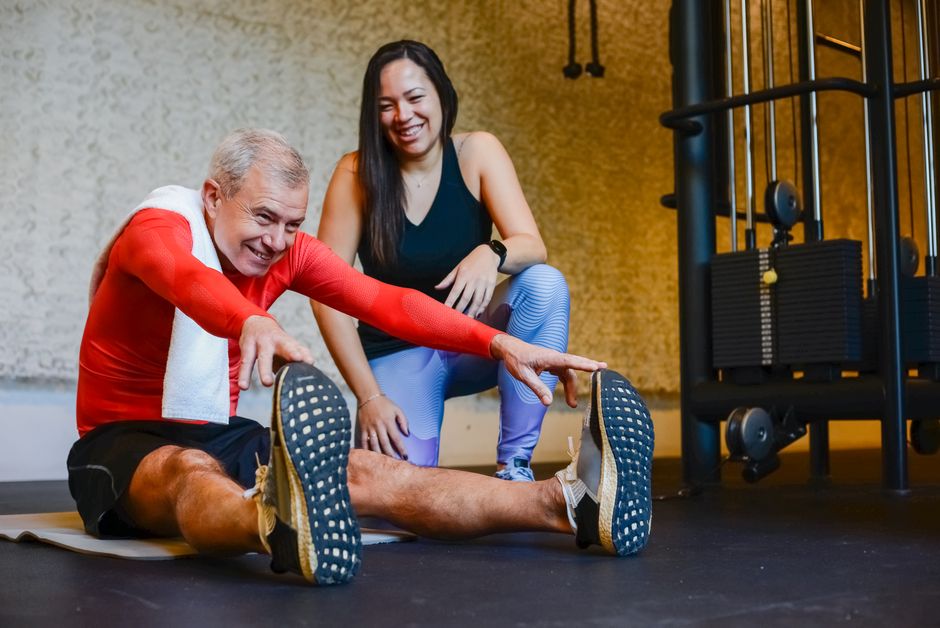 senior stretching legs exercise