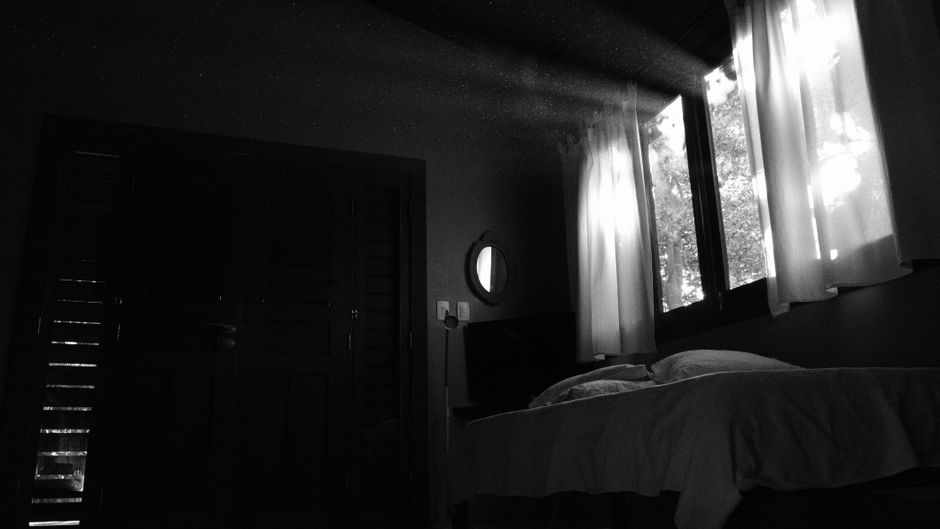 dark cool quiet bedroom blackout curtains