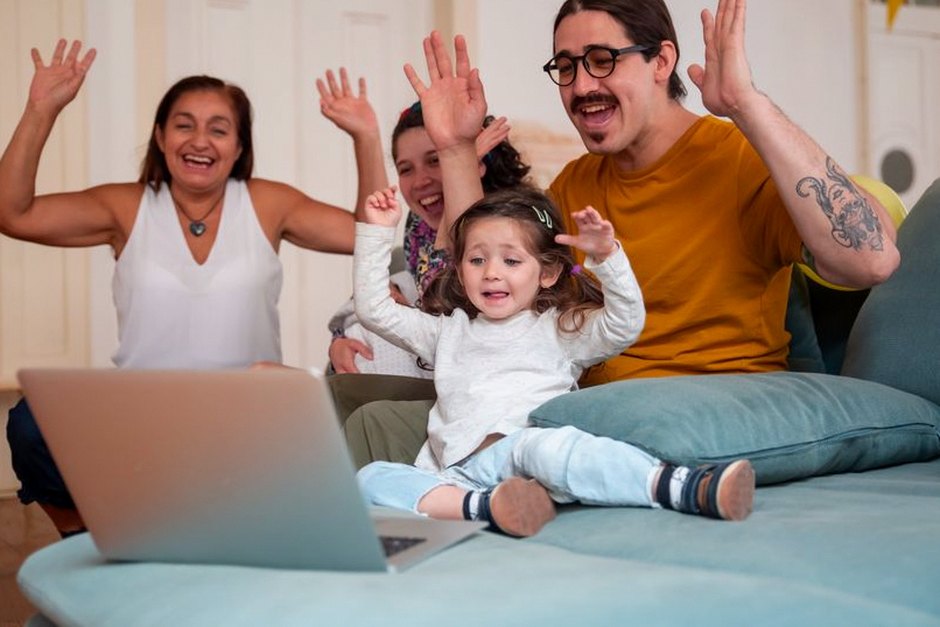 multigenerational family video call smiling