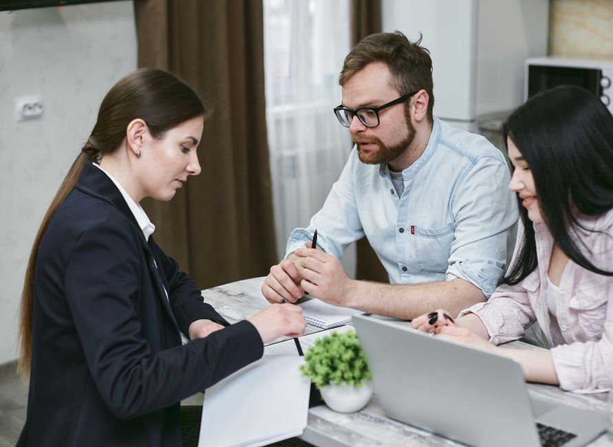 korean insurance consultant explaining to client