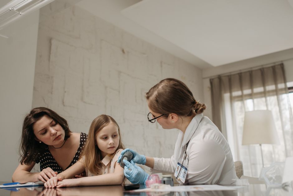 mother and child doctor visit clinic