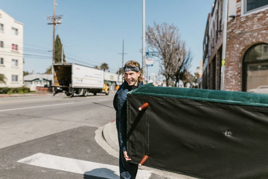 moving truck movers carrying boxes