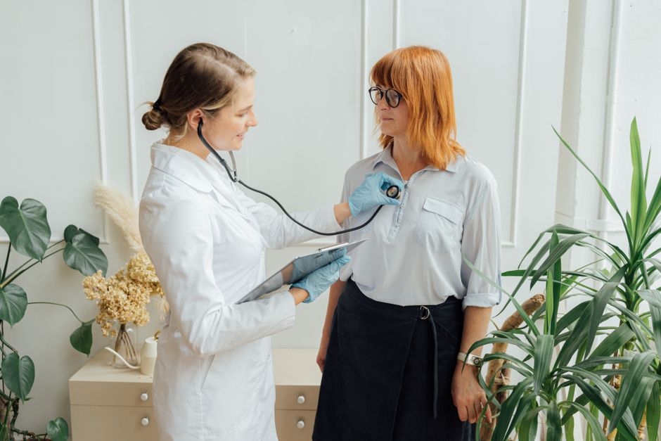 doctor checking patient health