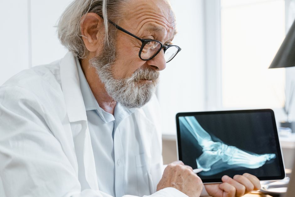 doctor talking to senior patient