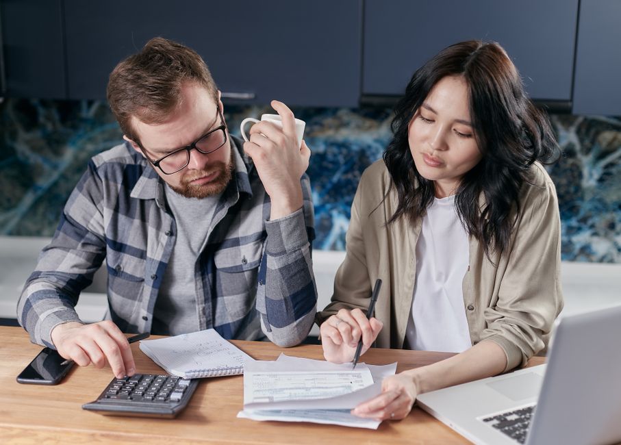 young couple budgeting finance planning