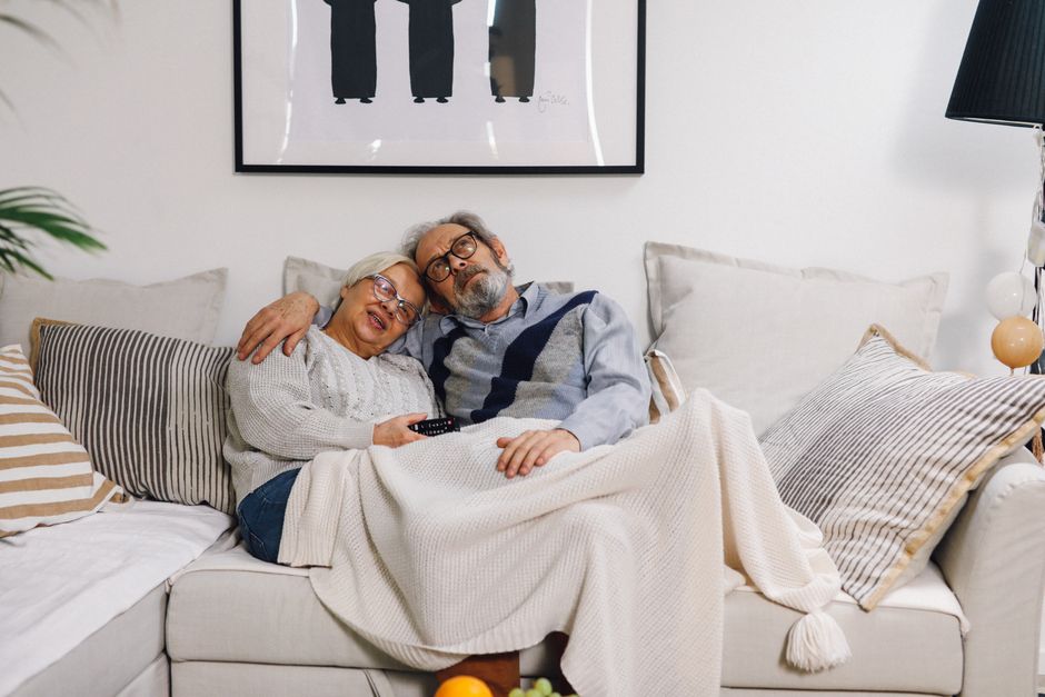 happy korean retired couple at home