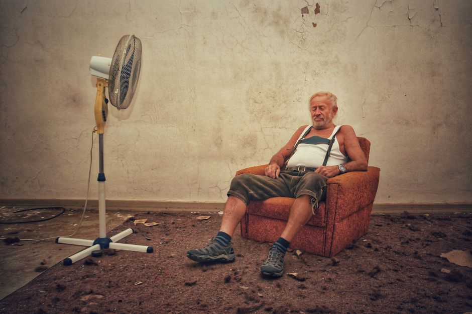 elderly korean man resting summer heat