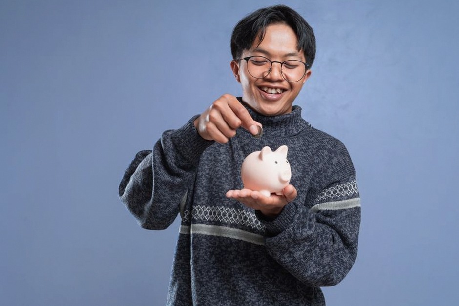 happy person checking bank savings phone