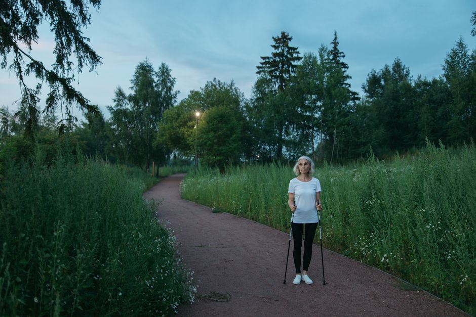 senior walking exercise evening park
