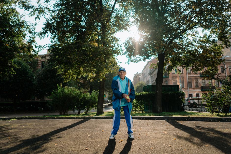 senior man walking morning park