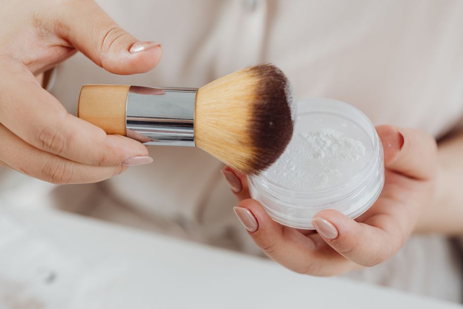 applying powder to skin