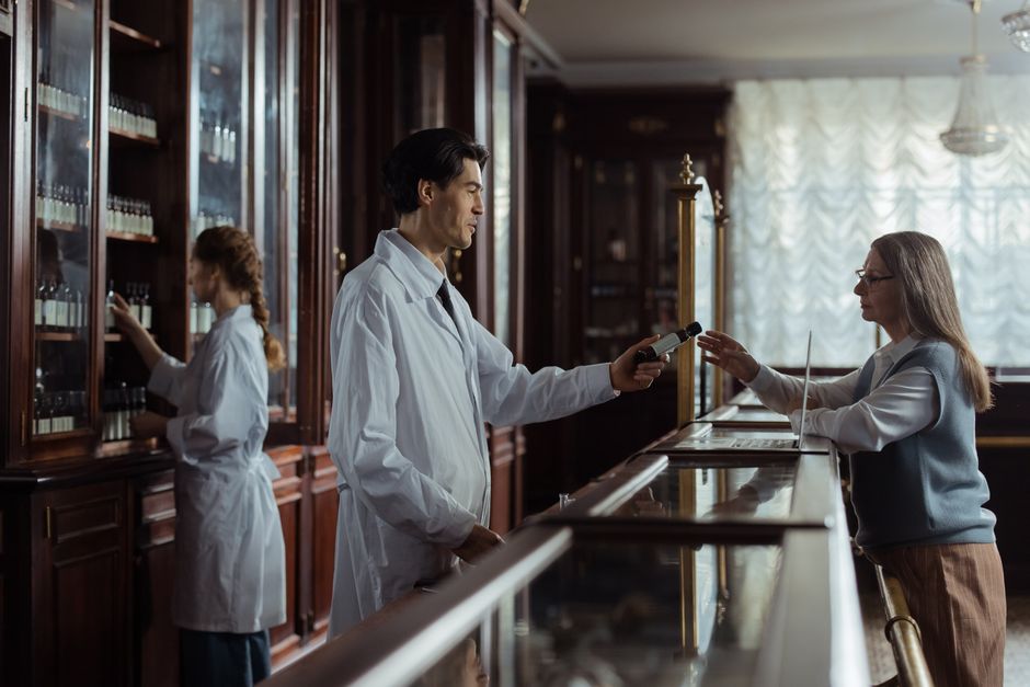 pharmacist explaining medication to patient
