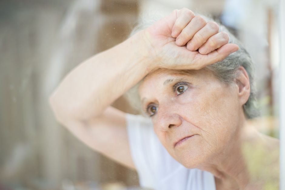 senior woman feeling dizzy