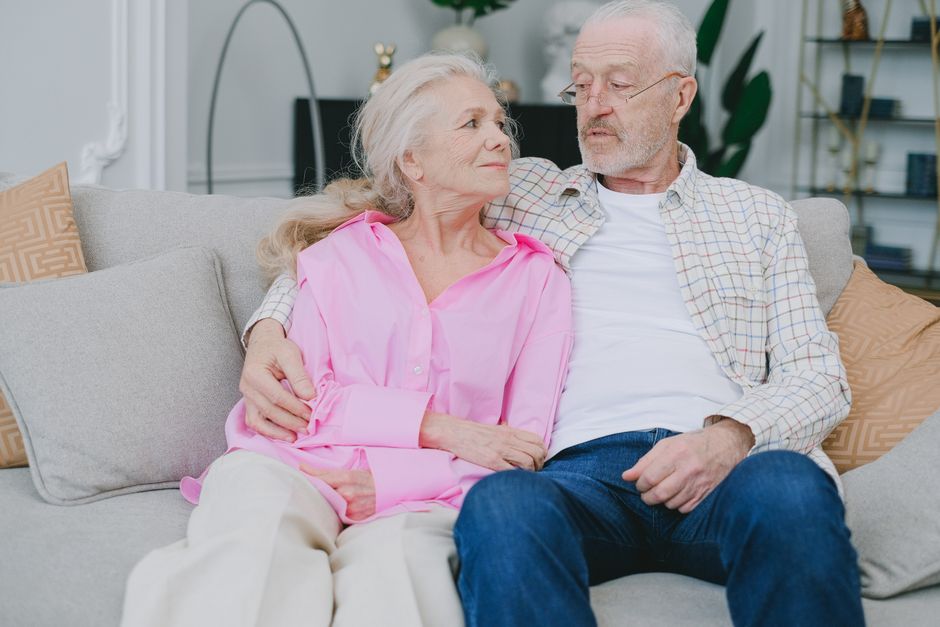 happy senior couple comfortable summer home
