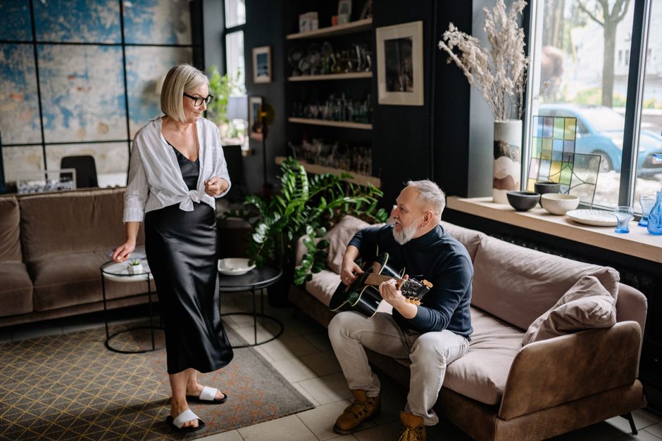 senior couple enjoying music together