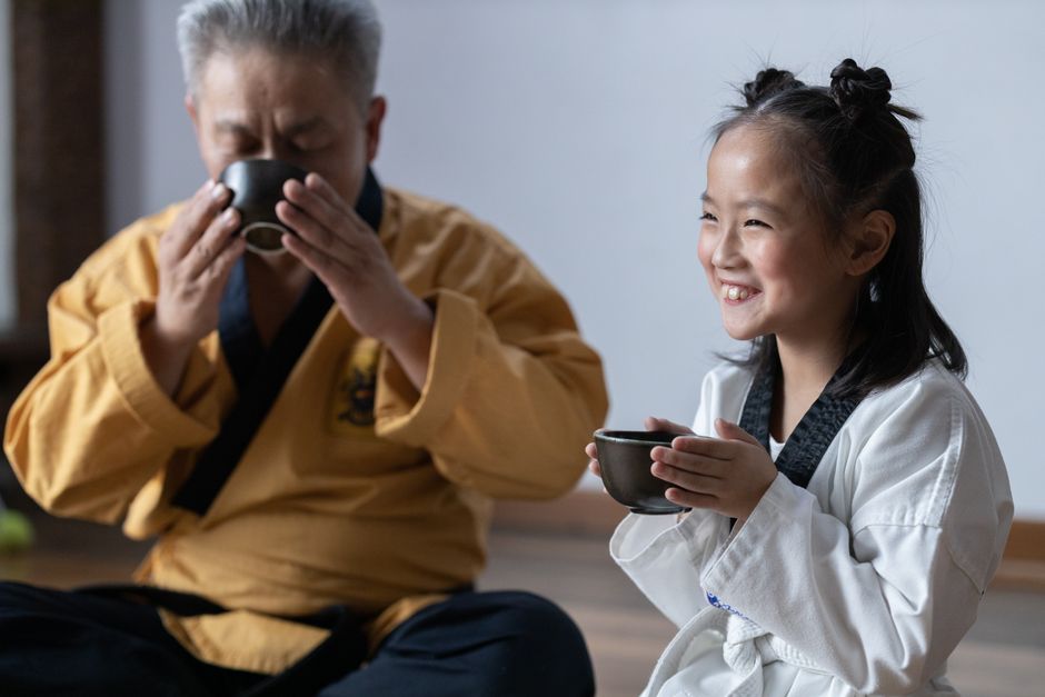 korean family drinking water outdoors summer