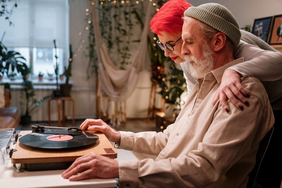 senior couple listening to music at home