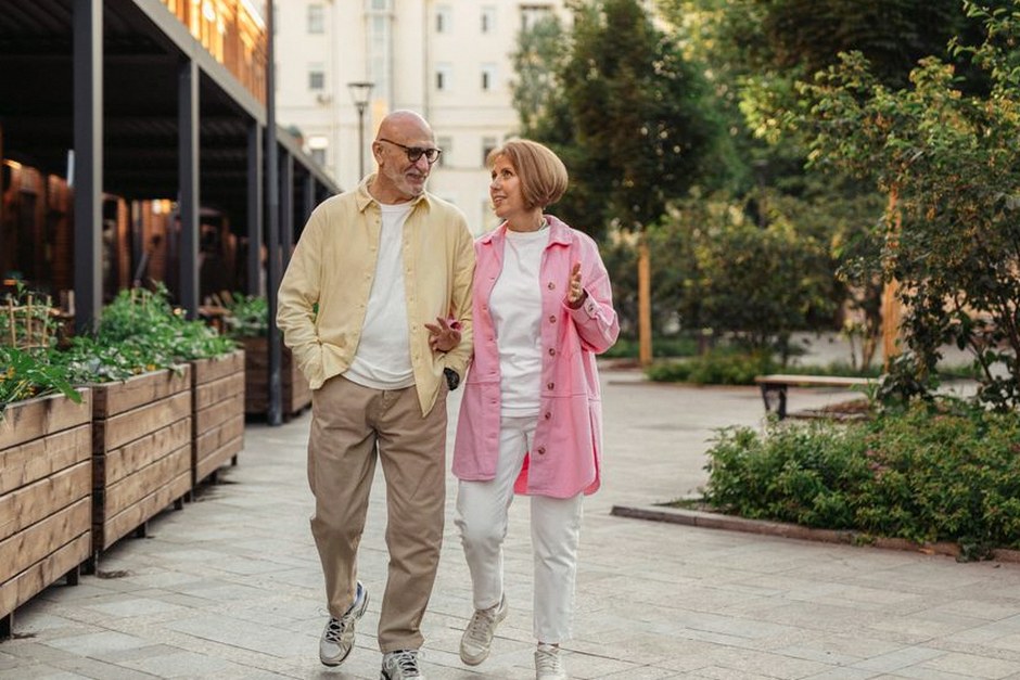 senior couple walking outdoors healthy lifestyle