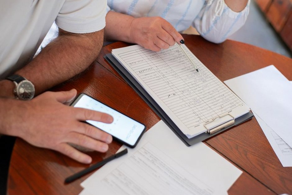 senior couple reviewing finances at home table