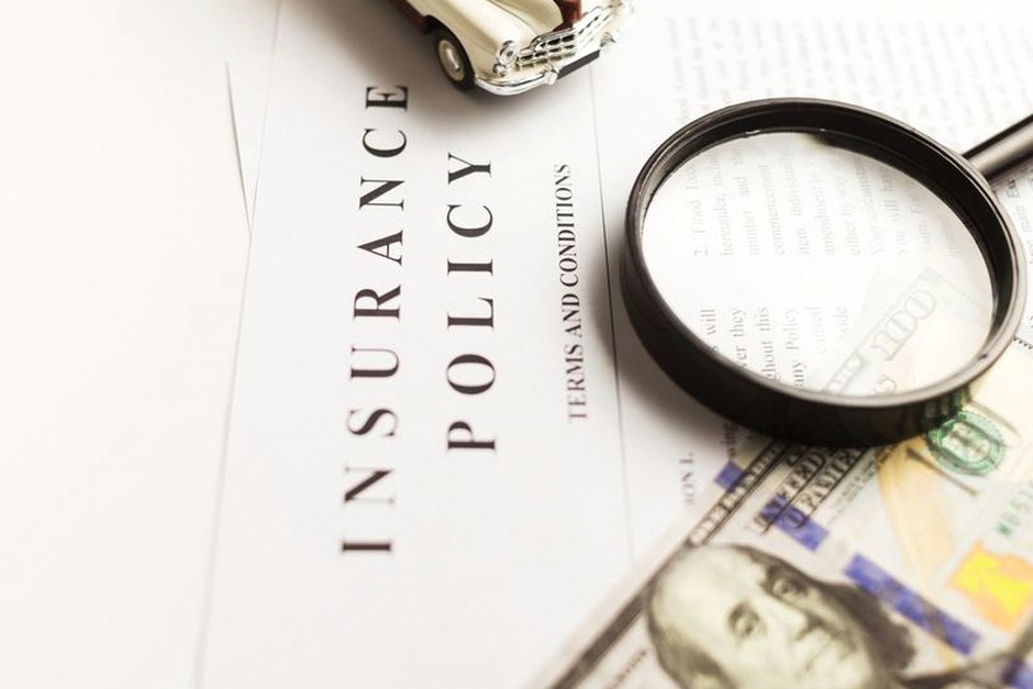 calculator and insurance policy documents
