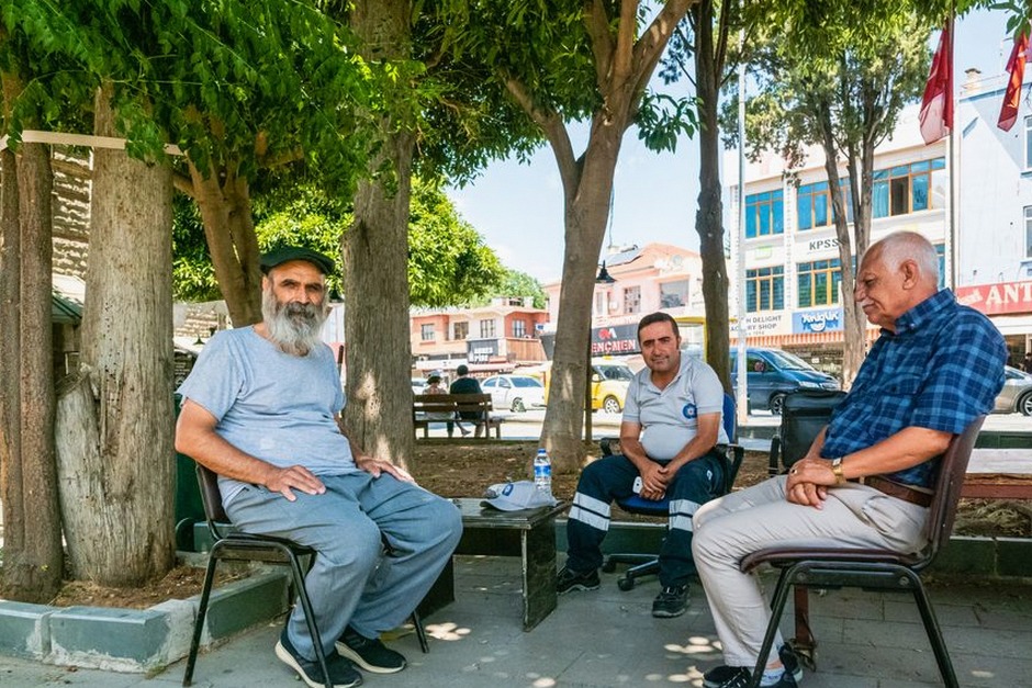 elderly friends chatting community center