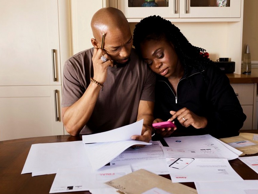 family discussing finances together
