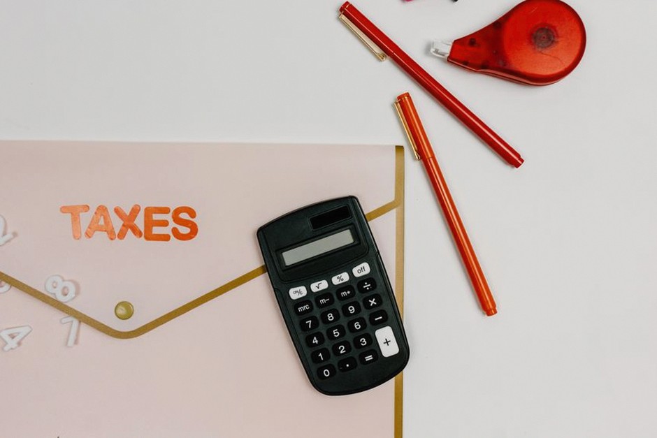 calculator tax documents desk